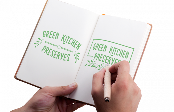 an example of graphic design of a logo in a sketchbook for green kitchens