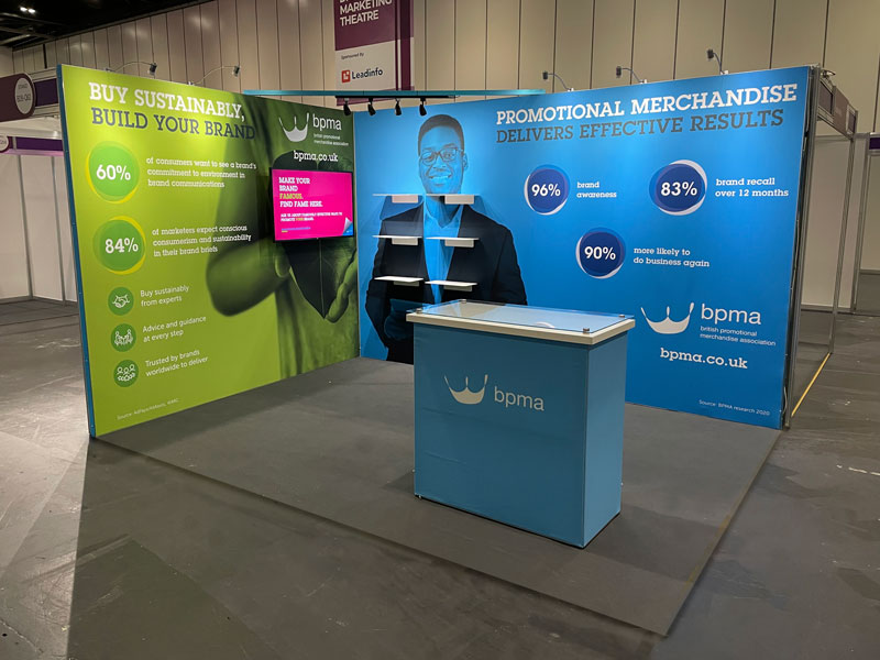 BPMA Eco-Friendly Tension Fabric Exhibition Stand, with magnetic floating shelves and a 49" TV and small reception counter